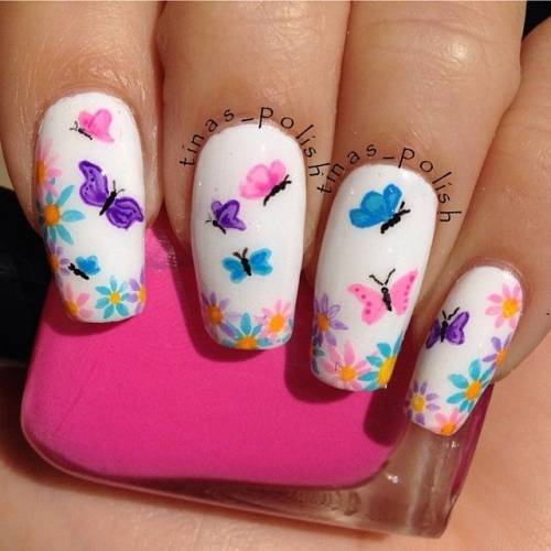 ideia de nail art de flor e borboleta